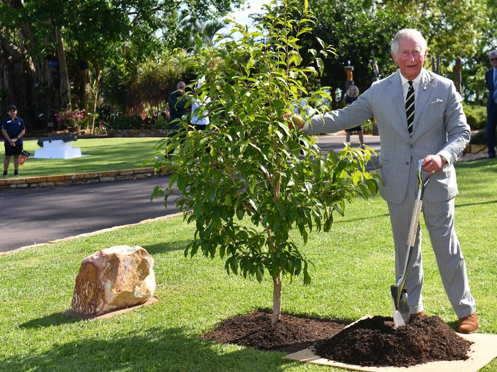 The then Prince of Wales plants a tree during a reception at Government House in Darwin, April 2018. Picture: Mick Tsikas/Getty Images