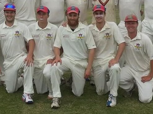 Oscar Jenkins pictured with his former cricket team (front row with beard)