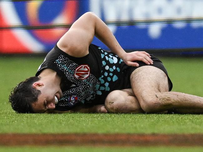 Josh Sinn went down in pain. Picture: Mark Brake/Getty Images