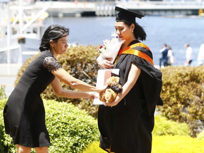 UTAS Graduations - Tasmanian School of Business and Economics and Graduate Research graduates are pictured before the ceremony. Picture: MATT THOMPSON