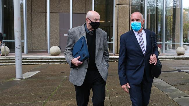 Chris Dawson, right, leaves the Supreme Court with his lawyer brother Peter Dawson. Picture NCA Newswire/ Gaye Gerard