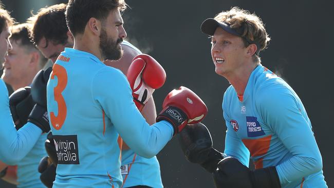 SYDNEY, AUSTRALIA - JUNE 09: Lachie Whitfield boxes during a Greater Western Sydney Giants AFL Training Session at GIANTS Stadium on June 09, 2020 in Sydney, Australia. (Photo by Mark Kolbe/Getty Images)