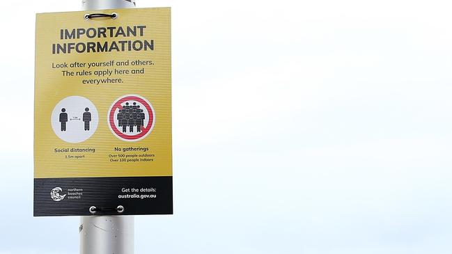 A sign showing social distancing rules at Manly BeachPicture: Cameron Spencer/Getty Images