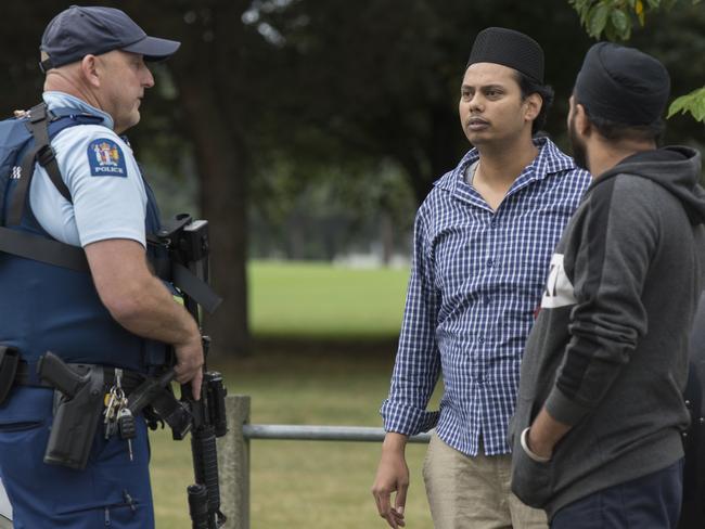 Police speak with witnesses following the mass shooting at the Masjid Al Noor mosque in Christchurch, New Zealand. Picture: AAP