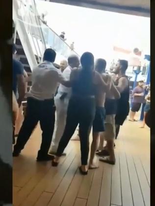 A scuffle on the lido deck.