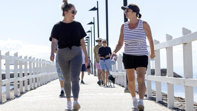 Wynnum foreshore has plenty of people out and about to get their exercise as people isolate for Coronavirus. Picture: Sarah Marshall