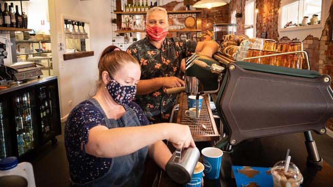 Bean Station Cafe barista Cassandra Negri and owner Rod Ayton in Wodonga. Picture: Simon Dallinger