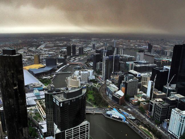 Smoke and dust hover above Melbourne. Picture: Aaron Francis