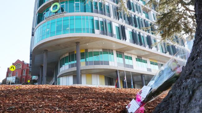 Flowers outside The Olivia Newton-John Cancer and Wellness Centre at Heidelberg after her death. Picture: David Crosling