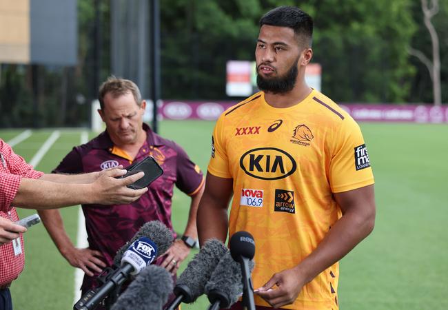 Brisbane Broncos player Payne Haas addresses the media with coach Kevin Walters. Picture Peter Wallis