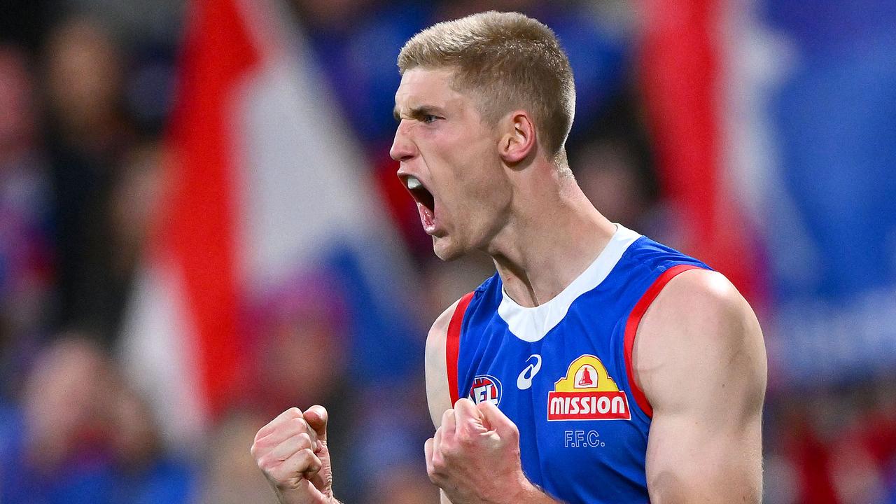 GEELONG, AUSTRALIA - AUGUST 26: Tim English of the Bulldogs celebrates a goal during the round 24 AFL match between Geelong Cats and Western Bulldogs at GMHBA Stadium, on August 26, 2023, in Geelong, Australia. (Photo by Morgan Hancock/Getty Images)