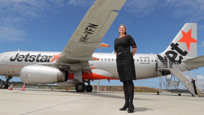 Jetstar crew can’t wait to get of the Gold Coast Airport tarmac and back in the air, including crew member Gabby Lavis. Picture: Glenn Hampson.