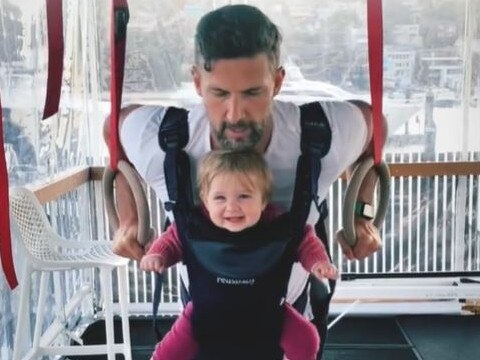 The Bachelor star Tim Robards and baby Elle are keeping fit at home.