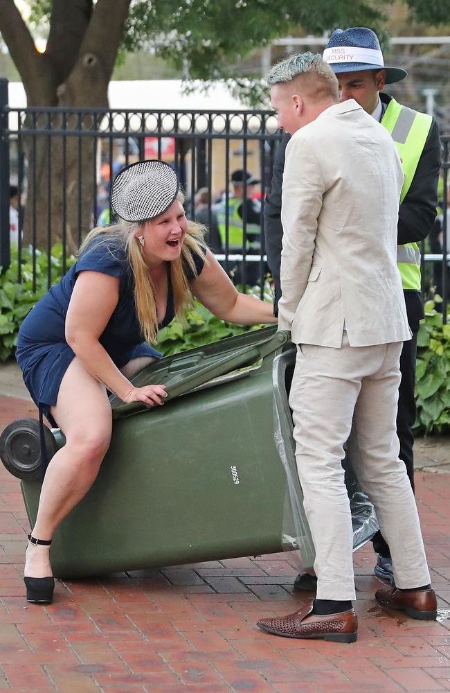 These two seem to have forgotten what a bin is for, but hey, they look happy. Picture: Scott Barbour/Getty Images