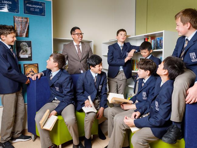 19-09-2024 - Ian Mejia, school principal at Hartford College, with some of the schoolÃs approximately 25 year 6, 7, and 8 students. Daceyville, Sydney. Picture: Max Mason-Hubers / The AustralianÃ