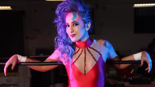 Pro wrestler Erika Reid in GLOW-inspired glam, with hair and make-up by Kerrie Stanley and Lexi Leigh and costumes from Rose Chong Costumes. Picture: Alex Coppel