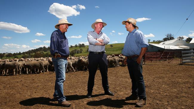 Barnaby Joyce, pictured with graziers Hamish and Jock McLaren of Nerstane Merino Stud, says he considered quitting politics in the wake of the citizenship scandal. Picture: Peter Lorimer.