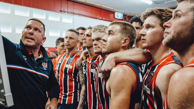 Wilston Grange head coach Brent Moloney at the halftime team talk. Picture: Brooke Sleep Media