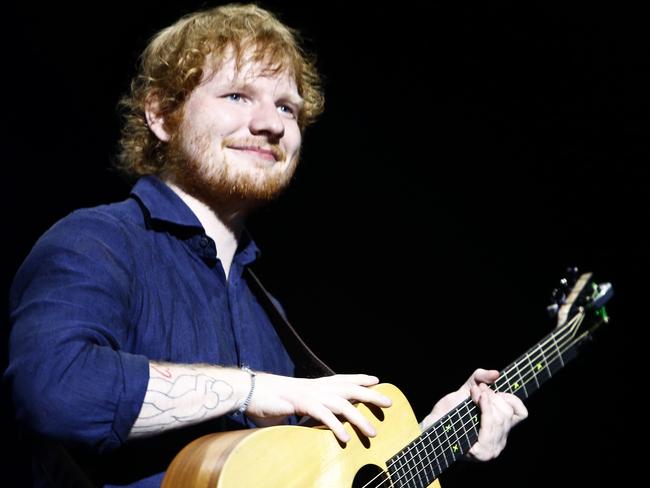 One man band ... Ed Sheeran has no problems flying solo on stage. Picture: Tim Hunter