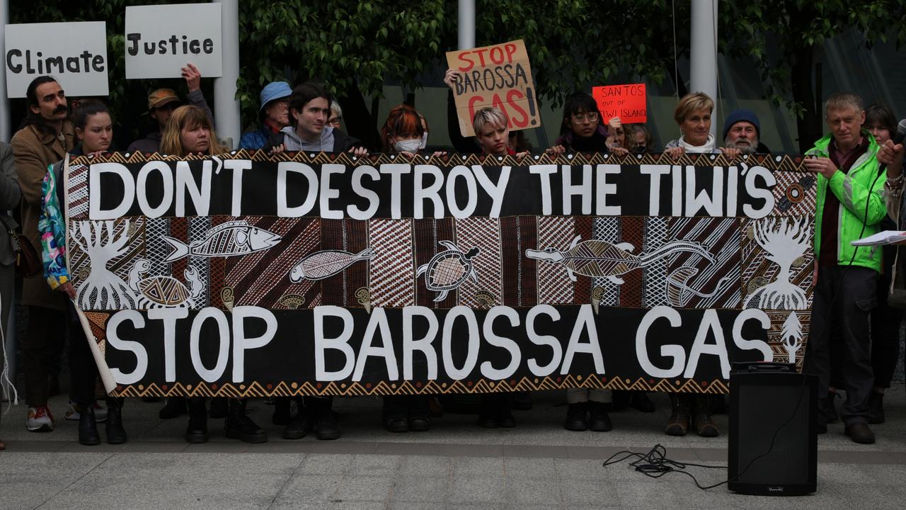 Protesters hold a banner at the front of the Federal Court. Picture: Getty Images