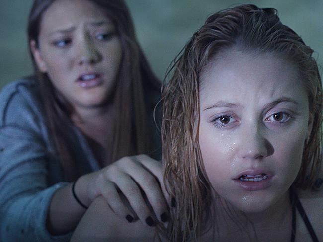 Lili Sepe and Maika Monroe in a scene from It Follows