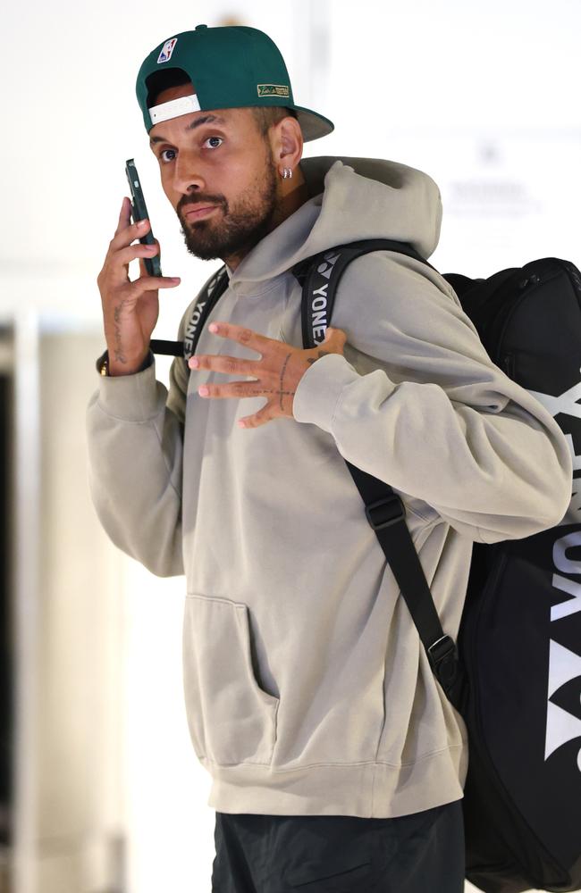 Nick Kyrgios arrives in Brisbane from Canberra ahead of the Brisbane International. Picture: David Clark