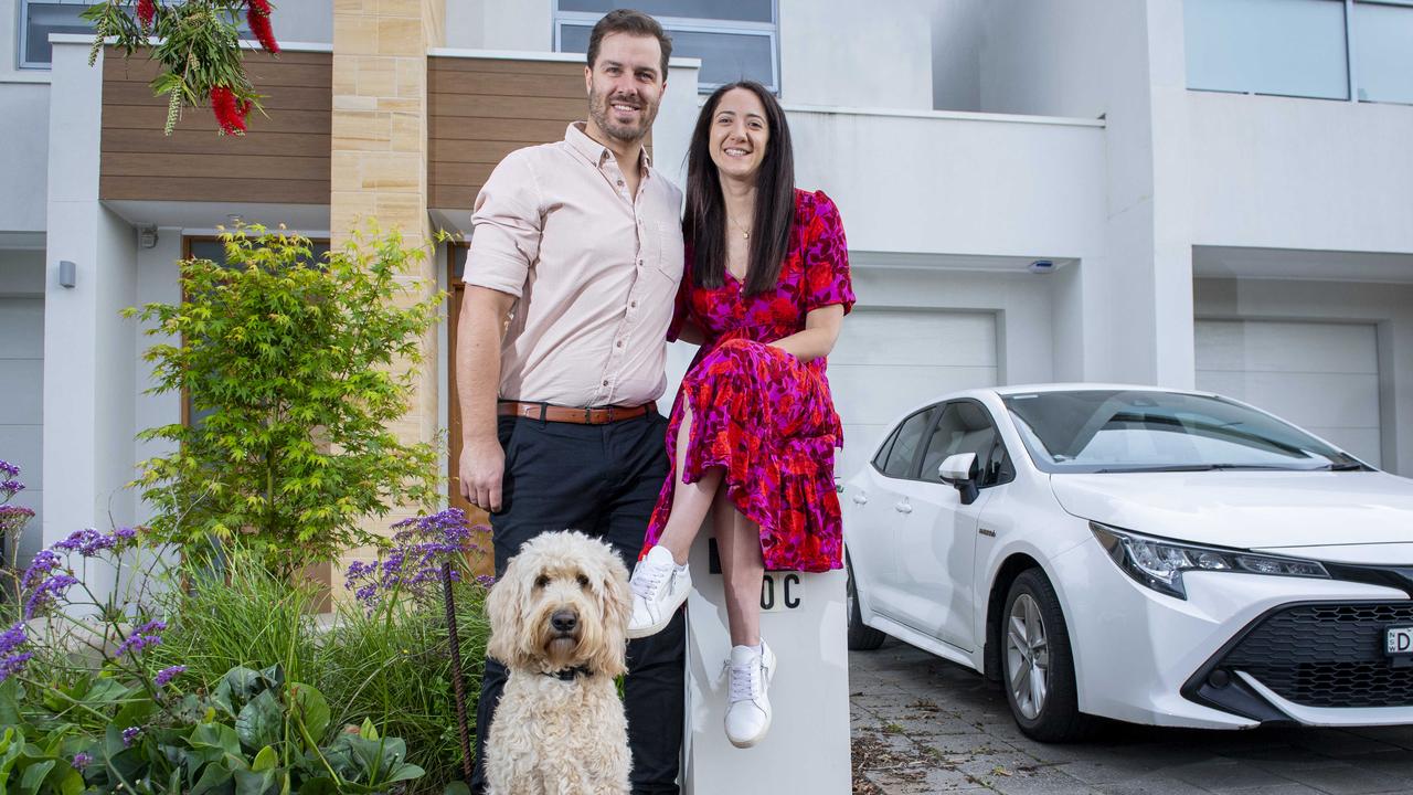 Candi Hindocha and Andrew Jones, pictured with their Groodle Winnie, are saving for their first home. Picture Mark Brake