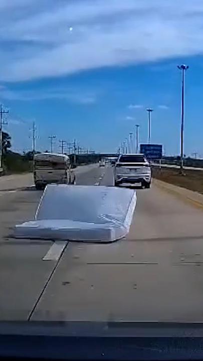 Dashcam captures moment mattress causes terrifying crash