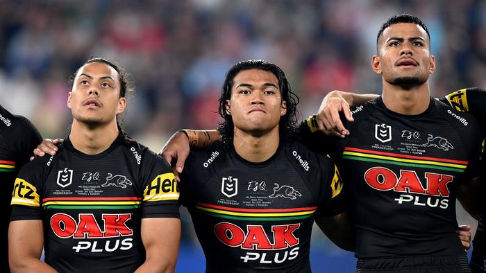 BRISBANE, AUSTRALIA - OCTOBER 03: (L-R) Jarome Luai, Brian To'o and Stephen Crichton of the Panthers embrace for the national anthem before the 2021 NRL Grand Final match between the Penrith Panthers and the South Sydney Rabbitohs at Suncorp Stadium on October 03, 2021, in Brisbane, Australia. (Photo by Bradley Kanaris/Getty Images)