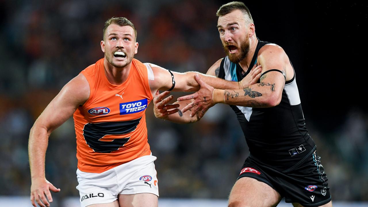 Kieren Briggs of the Giants rucks against Charlie Dixon of Port Adelaide.