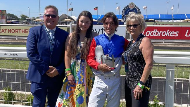 Brett Dixon, Simone Montgomerie’s now 15-year-old daughter Kodah, winning jockey Jarrod Todd and mother Lee-Anne. Picture: Max Hatzoglou