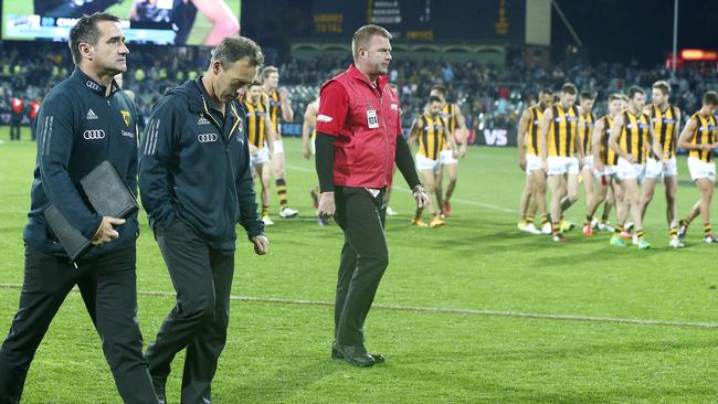 A dejected Alastair Clarkson leaves Adelaide Oval at the same time as his disappointed players. Picture: Sarah Reed