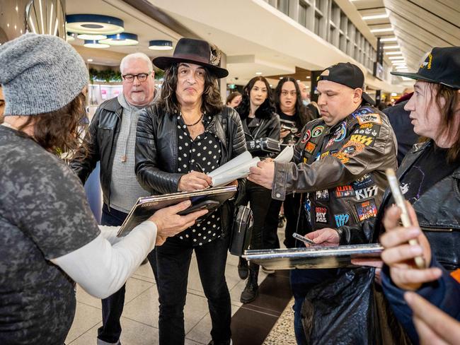 Paul Stanley signs autographs for fans upon arrival at Melbourne Airport to begin the Australian leg of the End of the Road Tour. Picture: Jake Nowakowski