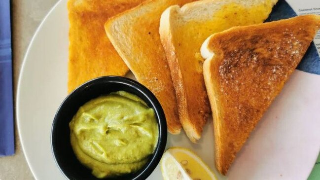 A customer has vented their fury on social media after paying $15 for smashed avocado on sourdough only to received a bits of regular toast from the supermarket. Picture: Facebook