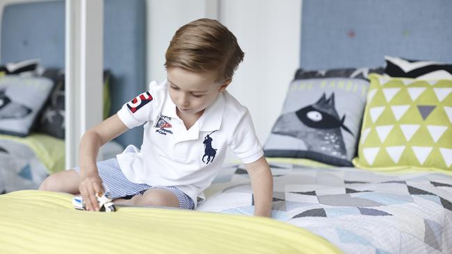 Oscar’s room has pops of colour. Photo: Julie Adams