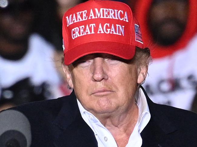 (FILES) In this file photo taken on January 15, 2022, former US President Donald Trump speaks during a rally at the Canyon Moon Ranch festival grounds in Florence, Arizona, southeast of Phoenix. - Merrick Garland, the US attorney general, was denied a lifetime seat on the Supreme Court by Republicans in the Senate. He now faces a decision arguably every bit as weighty as anything he may have faced on the nation's highest court: the potential prosecution of a former president of the US. The 69-year-old Garland personally approved the stunning August 8 FBI search of Donald Trump's Florida home and will have the final say on whether he is to be charged with any crimes. (Photo by Robyn Beck / AFP)