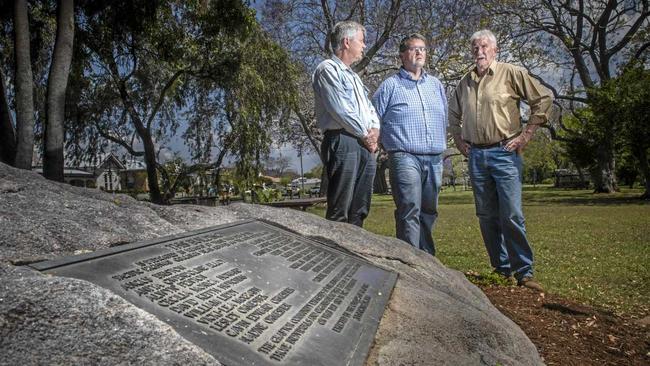 David Bancroft, Richie Williamson and Bryan Robins look over the Cowper Memorial at See Park in preparation for the 30th anniversary of the Cowper Bus Crash. Picture: Adam Hourigan