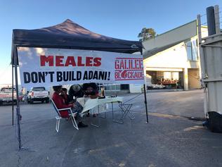 Anti-Adani ‘cake stall’ blocks work site