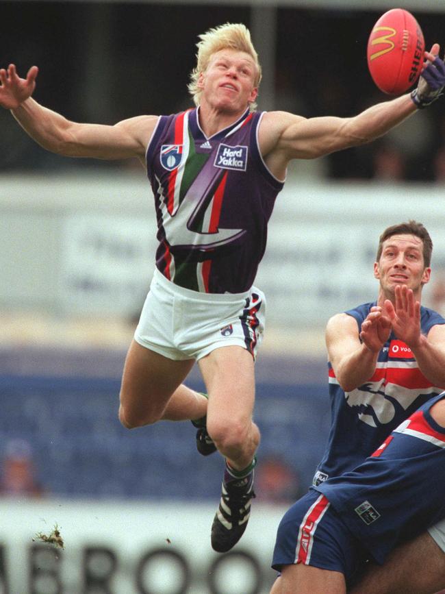 Waterhouse hauls in a mark in 1999.