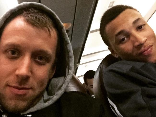 Aussie teammates Joe Ingles and Dante Exum ham it up on a team flight.