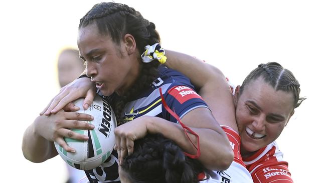 Tiana Raftstrand-Smith is tackled during round seven. (Photo by Ian Hitchcock/Getty Images)