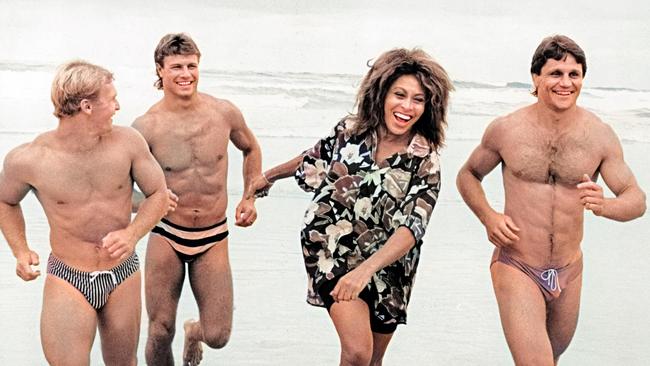 Tina Turner with Allan Langer, Andrew Ettingshausen and Wayne Pearce during filming of the Simply the Best advertising campaign.