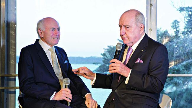 Jones interviews former prime minister John Howard at a charity event in October.