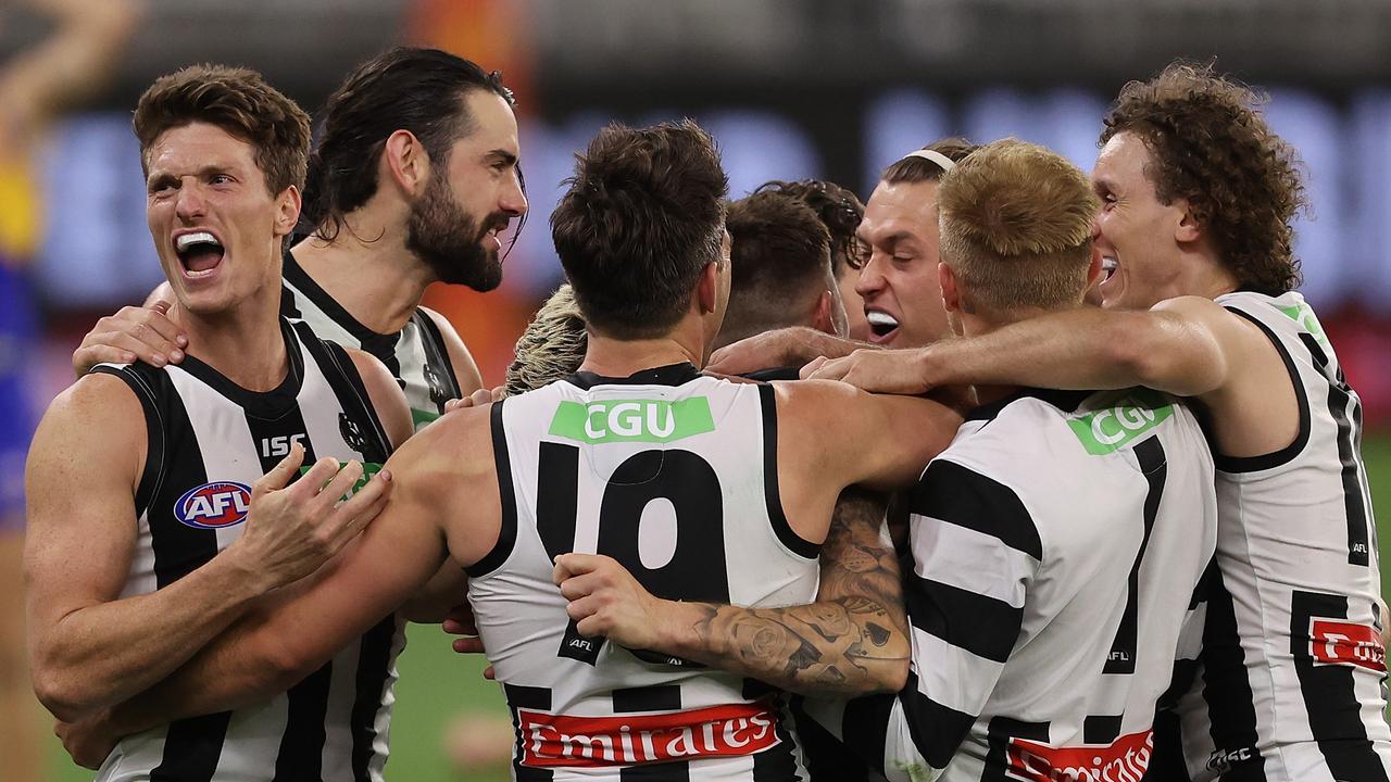 PERTH, AUSTRALIA - OCTOBER 03: Brody Mihocek of the Magpies celebrates with team mates after winning the AFL First Elimination Final match between the West Coast Eagles and the Collingwood Magpies at Optus Stadium on October 03, 2020 in Perth, Australia.  (Photo by Paul Kane/Getty Images)