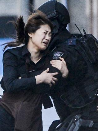 Police attend a siege in the Lindt shop in Sydney's Martin Place. Photos: Chris McKeen