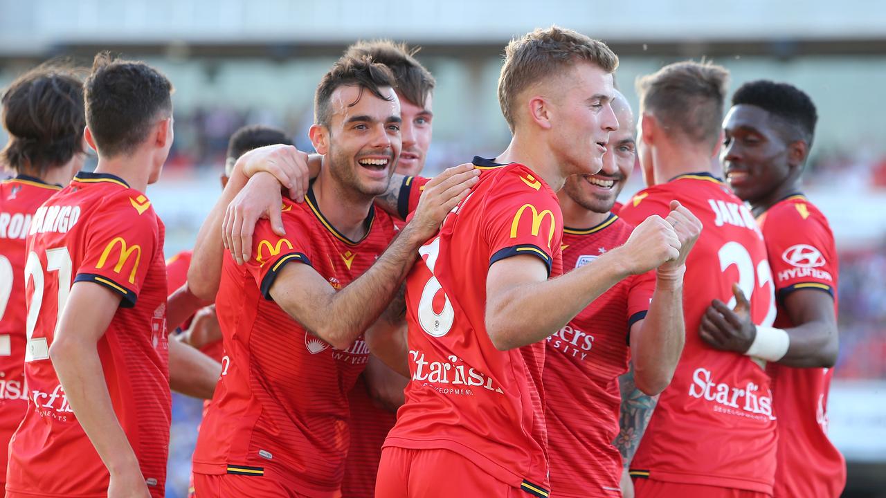 Adelaide celebrate with match-winner Riley McGree