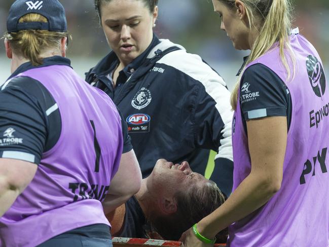 Brianna Davey is carried off the ground. Picture: AAP