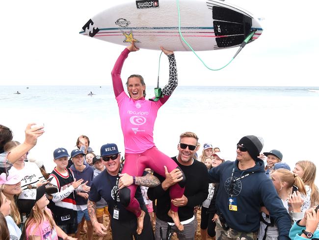 Courtney Conlogue chaired up the beach following her win over Stephanie Gilmore.