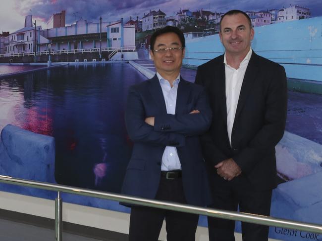 Founder of Luye Medical, Chairman Liu (left) and CEO of Healthe Care Steve Atkins (right) next to Maitland Private Hospital's Hydrotherapy pool.