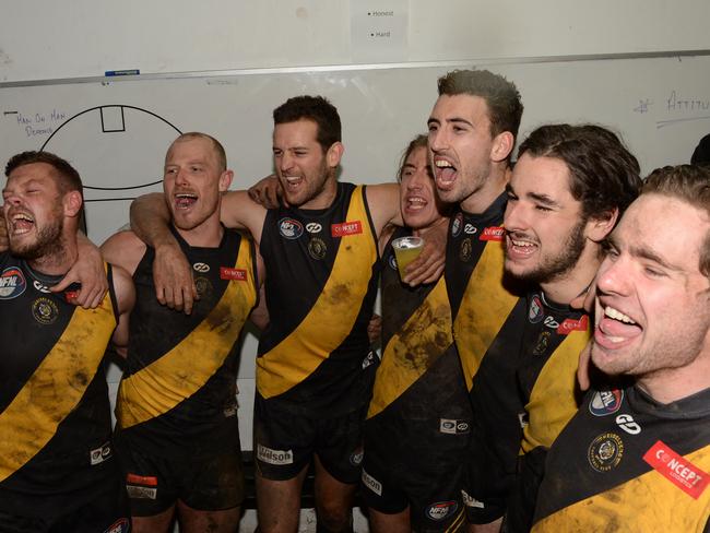 Heidelberg players sing the song. Picture: Chris Eastman/AAP